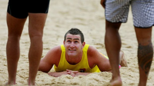 Looking pretty relaxed ... Newcastle forward Chris Houston trains at Nobbys Beach yesterday.