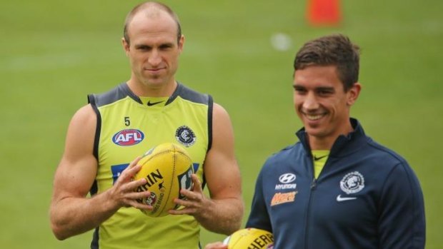 Chris Judd and Andrew Carrazzo of the Blues during a training session on Saturday.