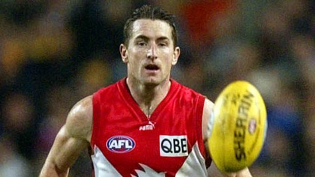 Darryn Cresswell in action for the Sydney Swans in 2002.