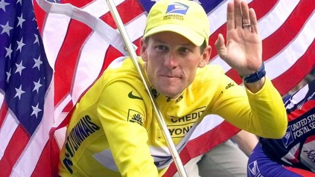 Champion ...  Lance Armstrong celebrates winning the Tour de France in 2000.