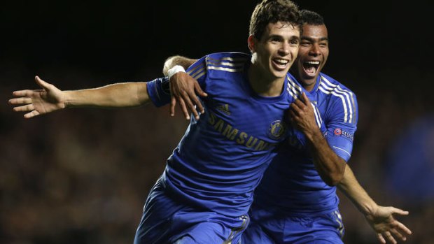 Chelsea's Oscar (left) celebrates his second goal against Juventus with teammate Ashley Cole.