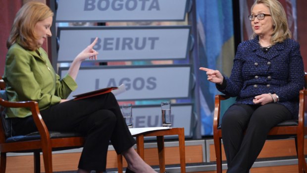 US Secretary of State Hillary Clinton speaks to moderator Leigh Sales during a town hall meeting and interview in Washington.