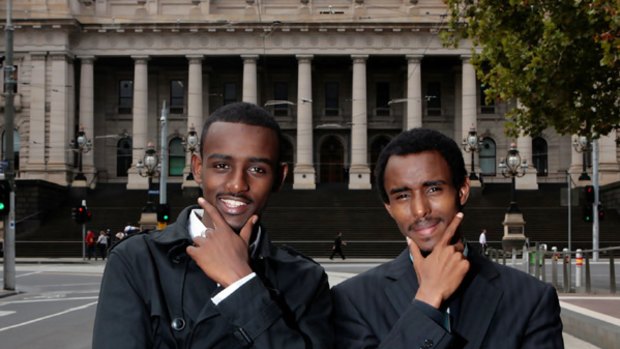 Abdi Elmi (left) and Ahmed Dini have graduated from a five-month Justice for Refugees program.