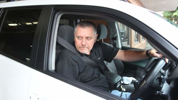 After the apology ... Ray Hadley leaves the 2GB offices at Pyrmont.