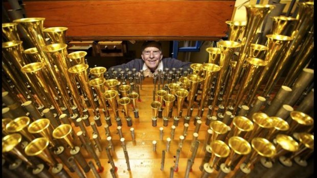 The space: Julien Arnold among the pipes in the sound compartment behind the stage of the Regent Theatre, Melbourne.