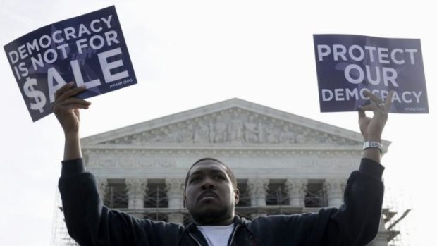 Cornell Woolridge of the US state of Maryland takes part in a demonstration outside the Supreme Court in 2013 as the court heard arguments on campaign finance.