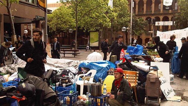 Standing their ground ... protesters at Martin Place this morning.