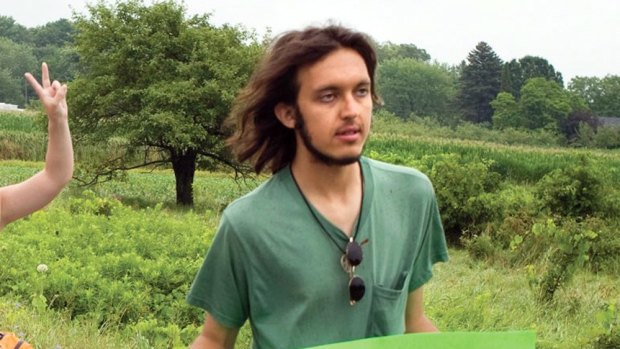 In this July 26, 2012 picture Alexander Ciccolo participates in a peace walk through Brighton, Ontario, Canada. 
