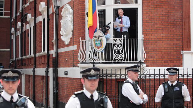 Julian Assange addressing the media last week from the balcony of the Equador embassy.