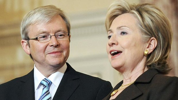 Kevin Rudd looks on as Hillary Clinton speaks.