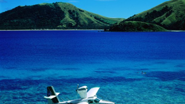 A plane in the shallow waters near the island of Sawa-i-Lau.