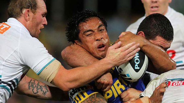 Body on the line ... Eels cult hero Fuifui Moimoi takes a lot of stopping.