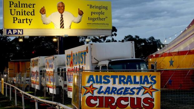 Clive Palmer's billboard in Rosehill is playing second banana to Stardust Circus.