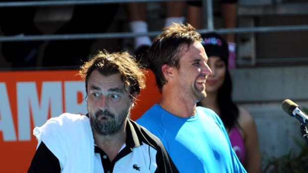 French follies .. Henri Leconte and Pat Rafter ham it up at the Champions Downunder tournament at Sydney Olympic Park yesterday.