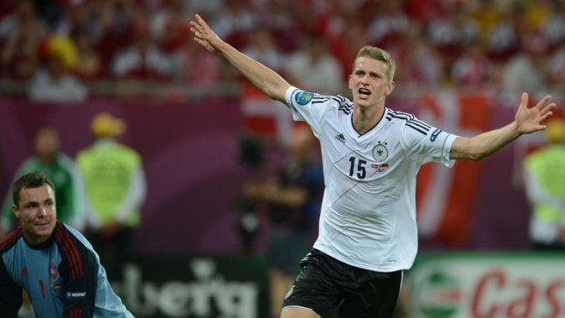 Germany's Lars Bender celebrates after scoring the winner against Denmark in Lviv.