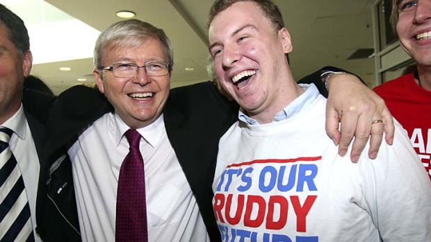 All smiles: Kevin Rudd with young fan Josh Gilligan at a shopping centre in Corio, Geelong, on Friday as part of his campaign with local Labor members.