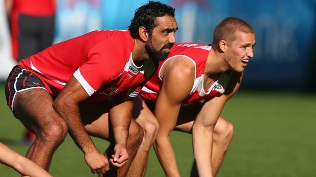 Sharp focus: Adam Goodes and Sam Reid on Tuesday.