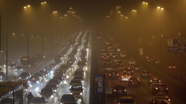 Controls coming: Vehicles drive on the Third Ring Road on a very hazy winter day in Beijing earlier this year.