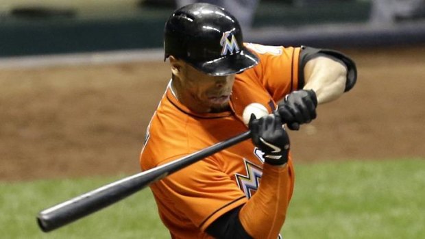 Giancarlo Stanton of the Miami Marlins is hit by a pitch. 