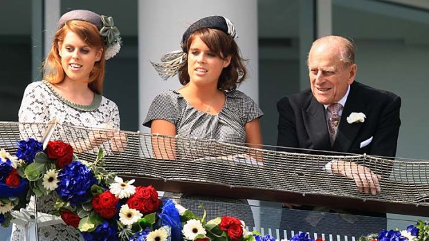 Family affair ... from left to right, Princess Beatrice, Princess Eugenie and Prince Philip.