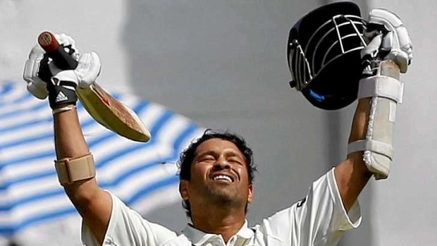 Sachin Tendulkar celebrates reaching his double century.