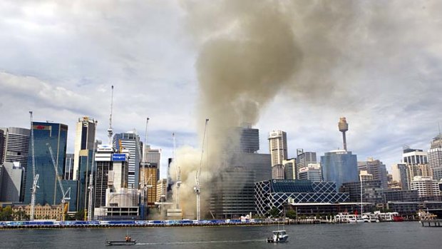 Inferno: Smoke billows into the sky over the Barangaroo construction site.