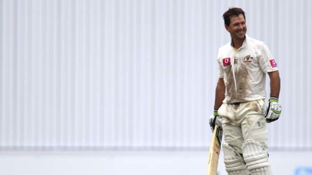 Dirty work ... Ricky Ponting cracks a smile after scoring his century at the SCG.