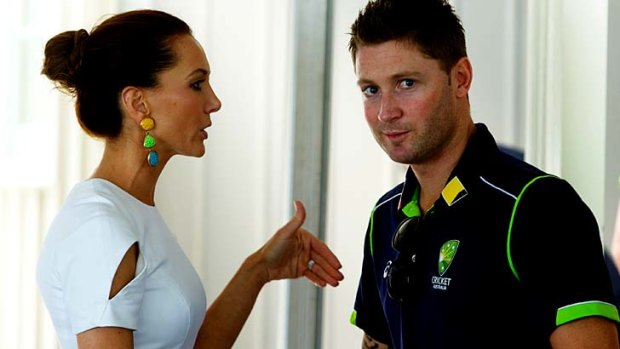 Now, remember your manners, and listen to your wife ... Kyly Clarke lays down the law for husband Michael at the Prime Minister's reception for the Australian and Sri Lankan teams on Tuesday.