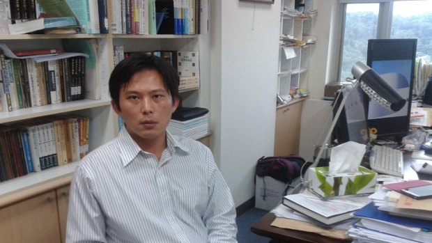 Plugging democracy: Sunflower Movement activist and legal scholar Huang Kuo-chang in his offices at the government-sponsored research institute Academia Sinica.