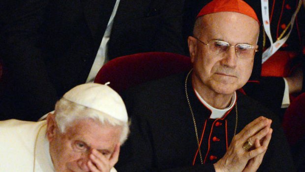 Pope Benedict and Vatican secretary of state Cardinal Tarcisio Bertone.