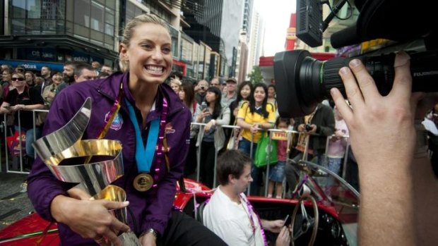 Firebirds captain Laura Geitz at a ticker tape parade celebrating the team's win in the Trans-Tasman series final. 