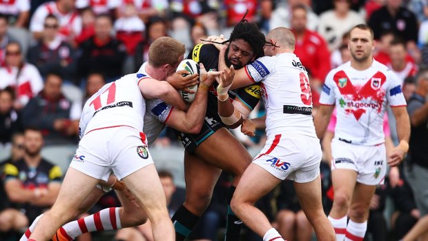 Jammed Panther: Penrith's Jamal Idris is tackled during his side's victory over St George Illawarra.