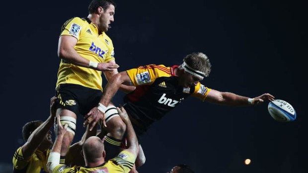 Jeremy Thrush of the Hurricanes loses the lineout ball to Craig Clarke of the Chiefs.
