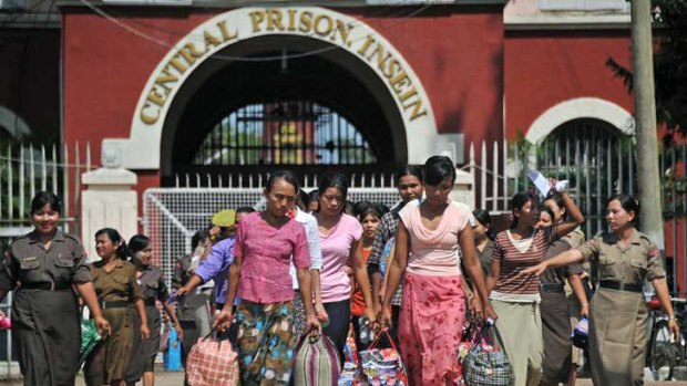 Prisoners walk out of the Insein Central Prison in Rangoon.