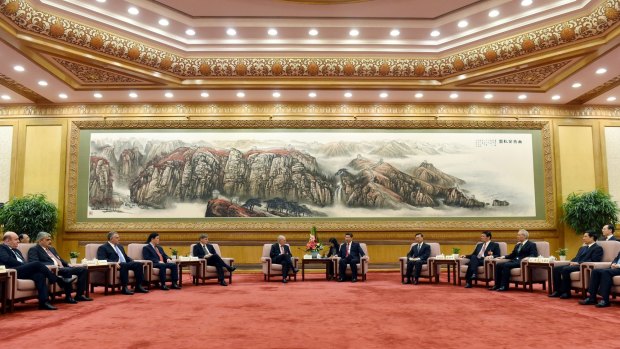 Chinese President Xi Jinping, centre right, at the signing ceremony for the Articles of Agreement of the Asian Infrastructure Investment Bank at the Great Hall of the People in Beijing.