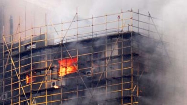 At least 50 dead ... fire engulfed this Shanghai high-rise.