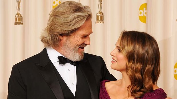 What did you think? Actress Natalie Portman (R), winner of the award for Best Actor in a Leading Role for 'Black Swan', and presenter Jeff Bridges.
