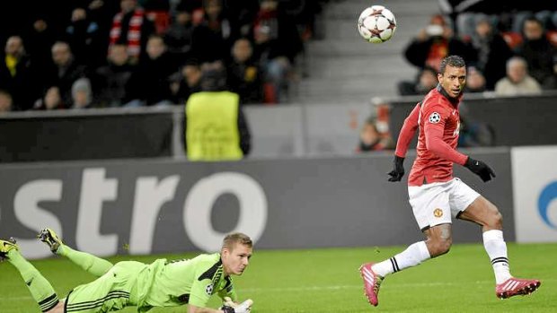 Nani skips past Bayern Leverkusen goalkeeper Bernd Leno to score Manchester United's fifth goal.
