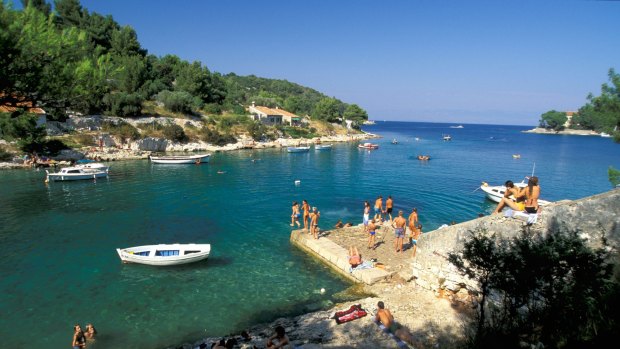 Beach fun in the Punta Bay, Losinj island.