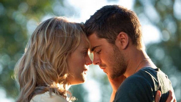 Battlefield of love ... Zac Efron plays a former marine alongside newcomer Taylor Schilling in <em>The Lucky One</em>.