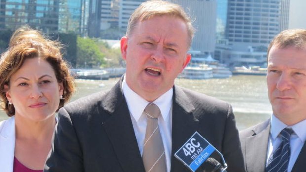 Emphasising unity: Anthony Albanese with state MP Jackie Trad and federal MP Graham Perrett in Brisbane.