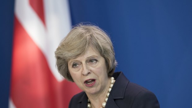 Theresa May, U.K. prime minister, speaks during a news conference with Angela Merkel, Germany's chancellor, not pictured, at the Chancellery in Berlin, Germany, on Wednesday, July 20, 2016. Merkel, who hosted May in Berlin on Wednesday during her first overseas trip as prime minister, said that EU rules stipulate a country must invoke Article 50 to start the process of leaving the 28-nation bloc. Photographer: Jasper Juinen/Bloomberg