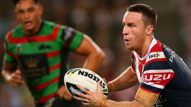 Wake up call: James Maloney of the Roosters.