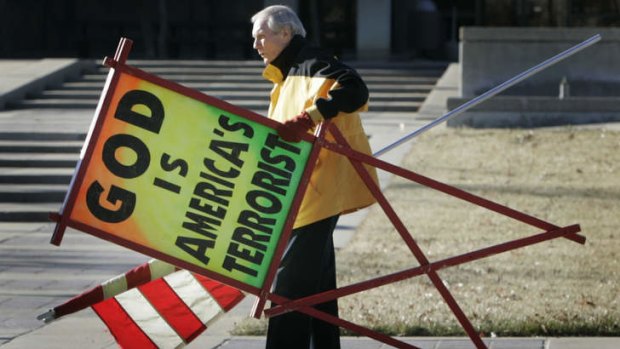 Fred Phelps prepares for a protest.