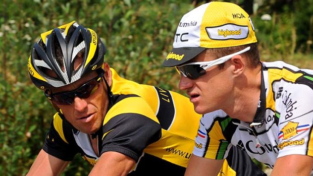 Bad news ... Lance Armstrong chats to Australia's Michael Rogers during the 2009 Tour de France. Rogers faces the prospect of another investigation after he was mentioned in USADA’s report.