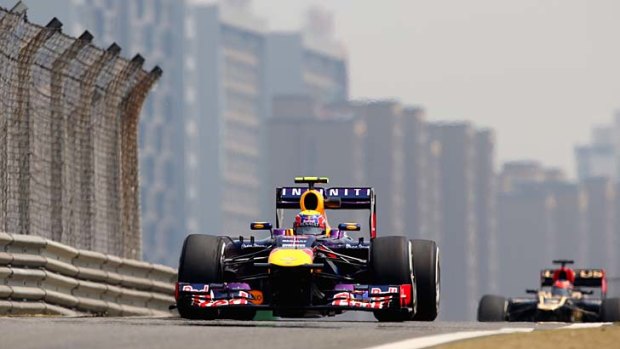 Flying laps: Mark Webber in practice for the Chinese Grand Prix.