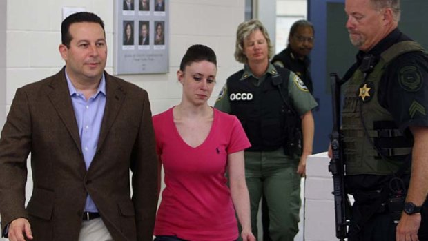 Casey Anthony walks out of jail with her lawyer, Jose Baez.