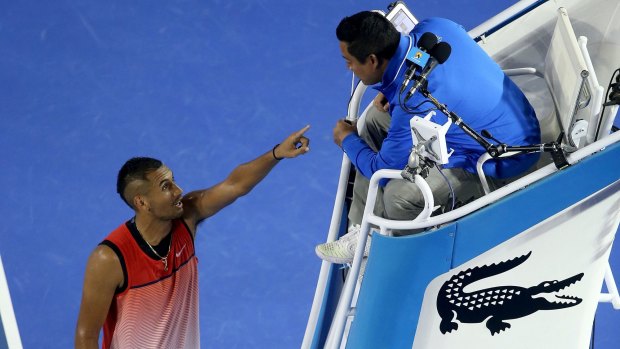 Ugly spat: Nick Kyrgios of Australia argues with the chair umpire during his third-round loss against Tomas Berdych.