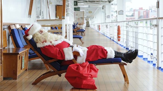 Suit yourself ... Santa rests up on a Princess cruise.