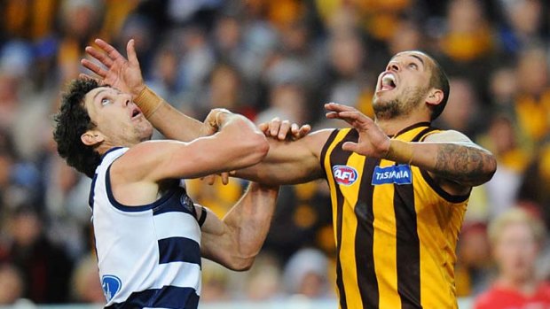 Hawthorn's Lance Franklin and Geelong's Harry Taylor.